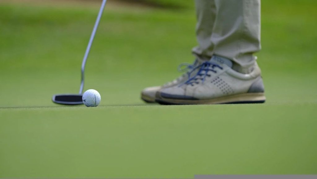 a man playing golf